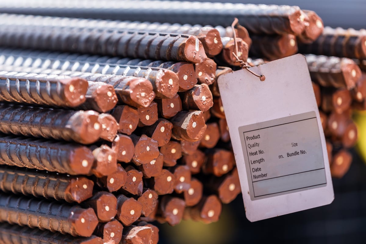 Deformed rebar bundles with identification tags prepared for specification review.