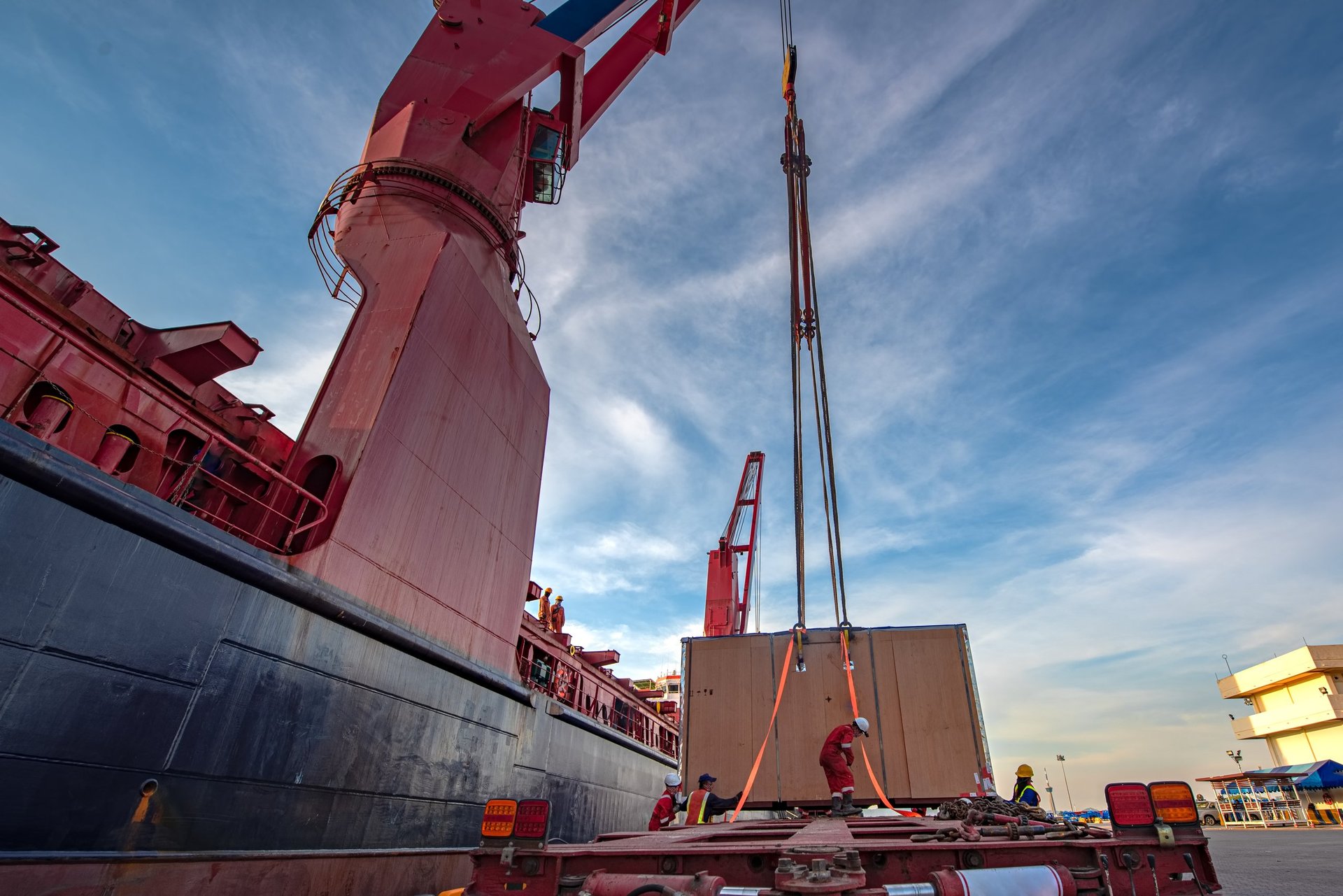 Bulk cargo being discharged at a port terminal under supervision, the leg where moisture content and handling conditions meet.