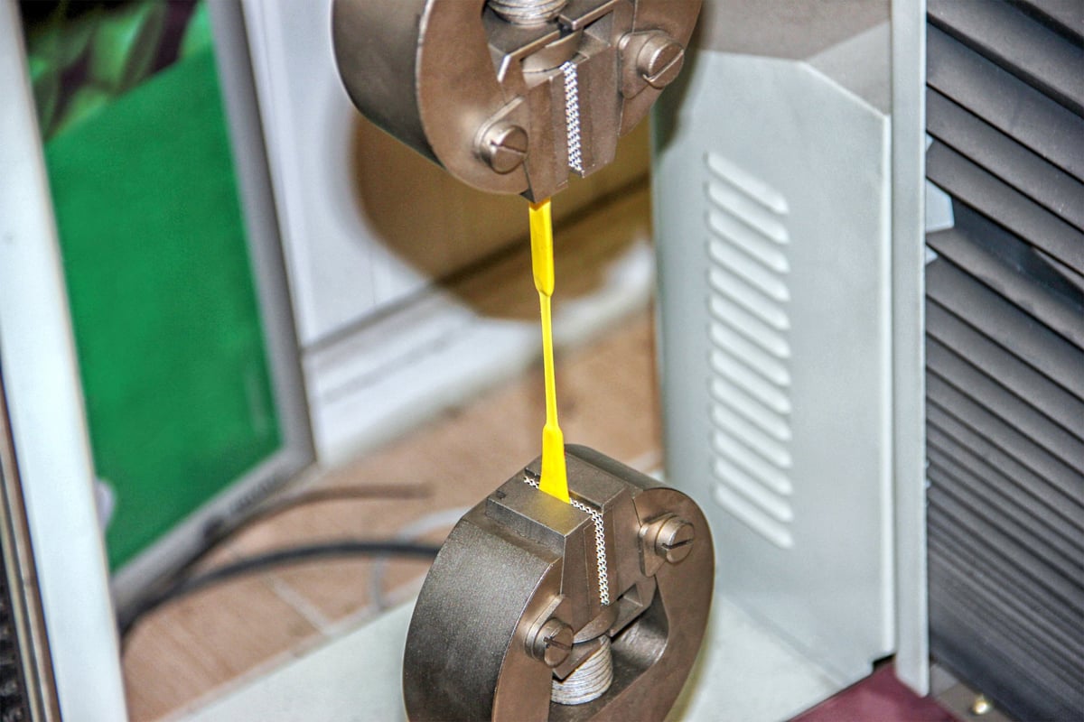 Mechanical testing of a steel specimen — the basis for a grade's stated properties