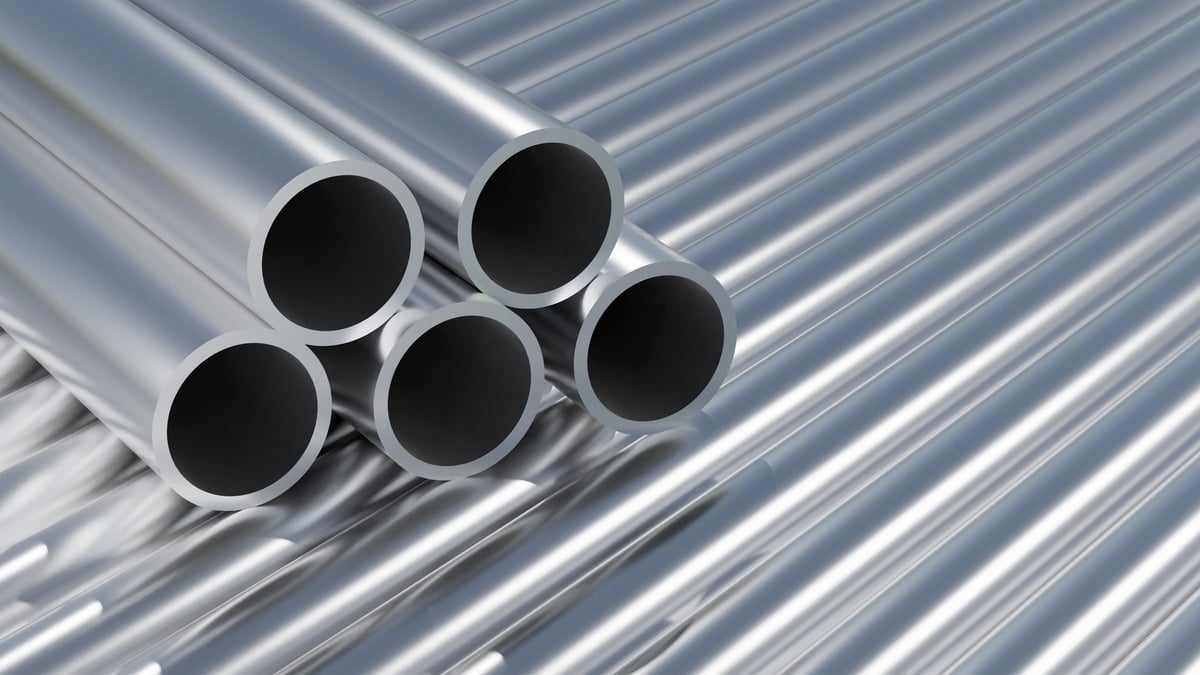 Stacks of metal pipe and tube sections in a storage rack