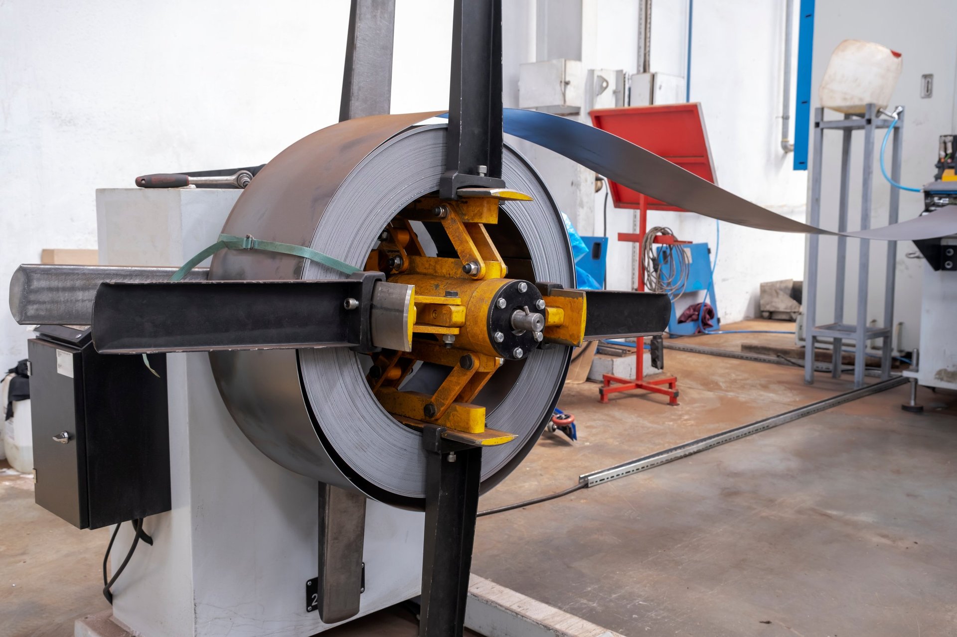 Steel strip on a processing line in a manufacturing plant