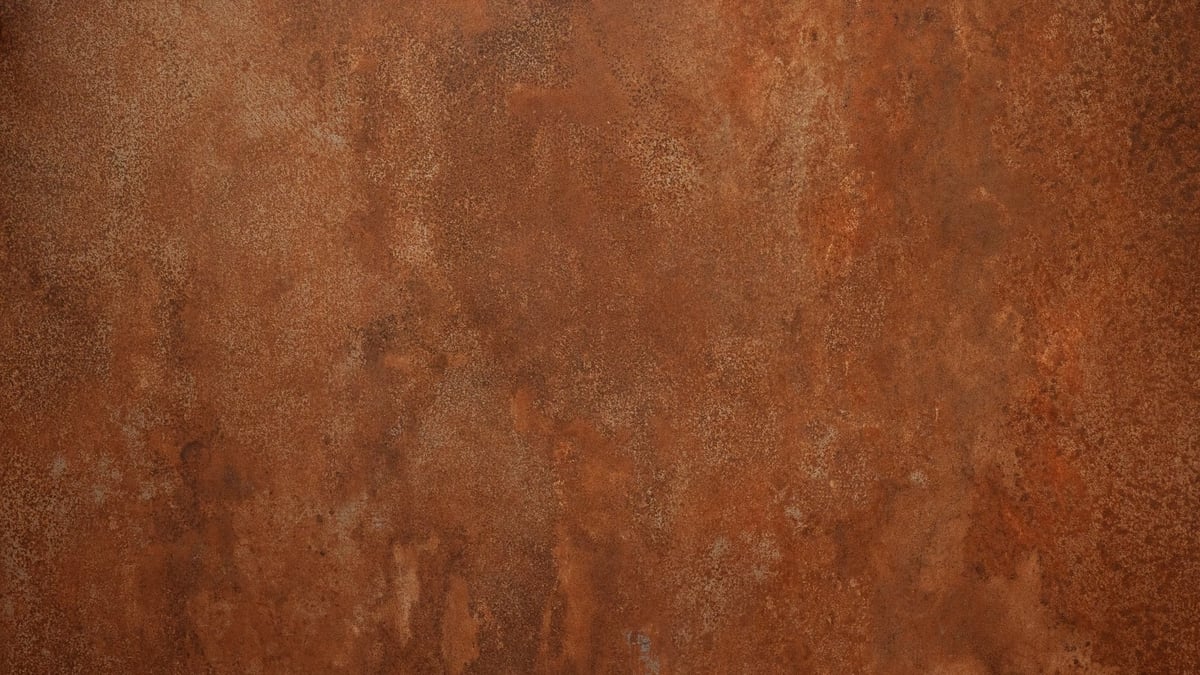 Oxidised mill scale on a steel surface — the layer pickling removes before the sheet is worked