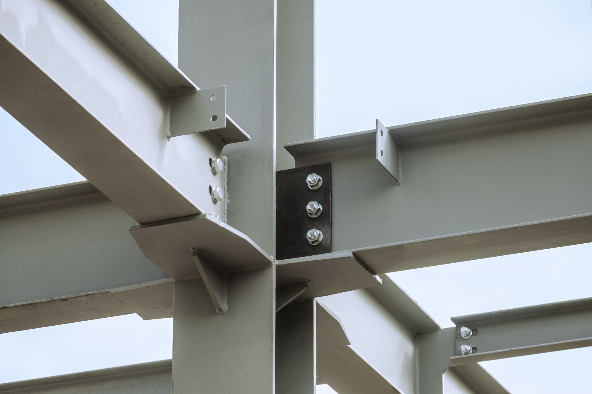 Bolted connection of steel H sections prepared for welding, showing the section geometry