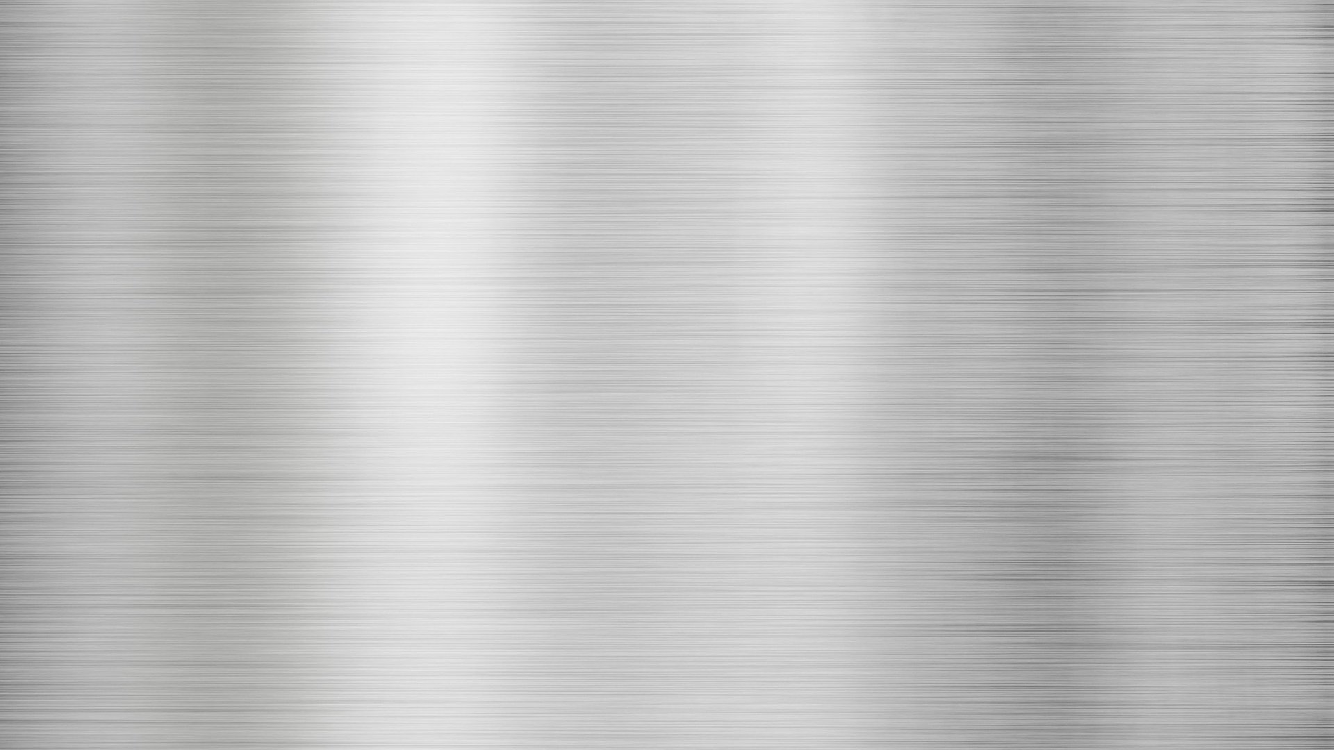 Brushed stainless steel sheet with a visible polished surface finish
