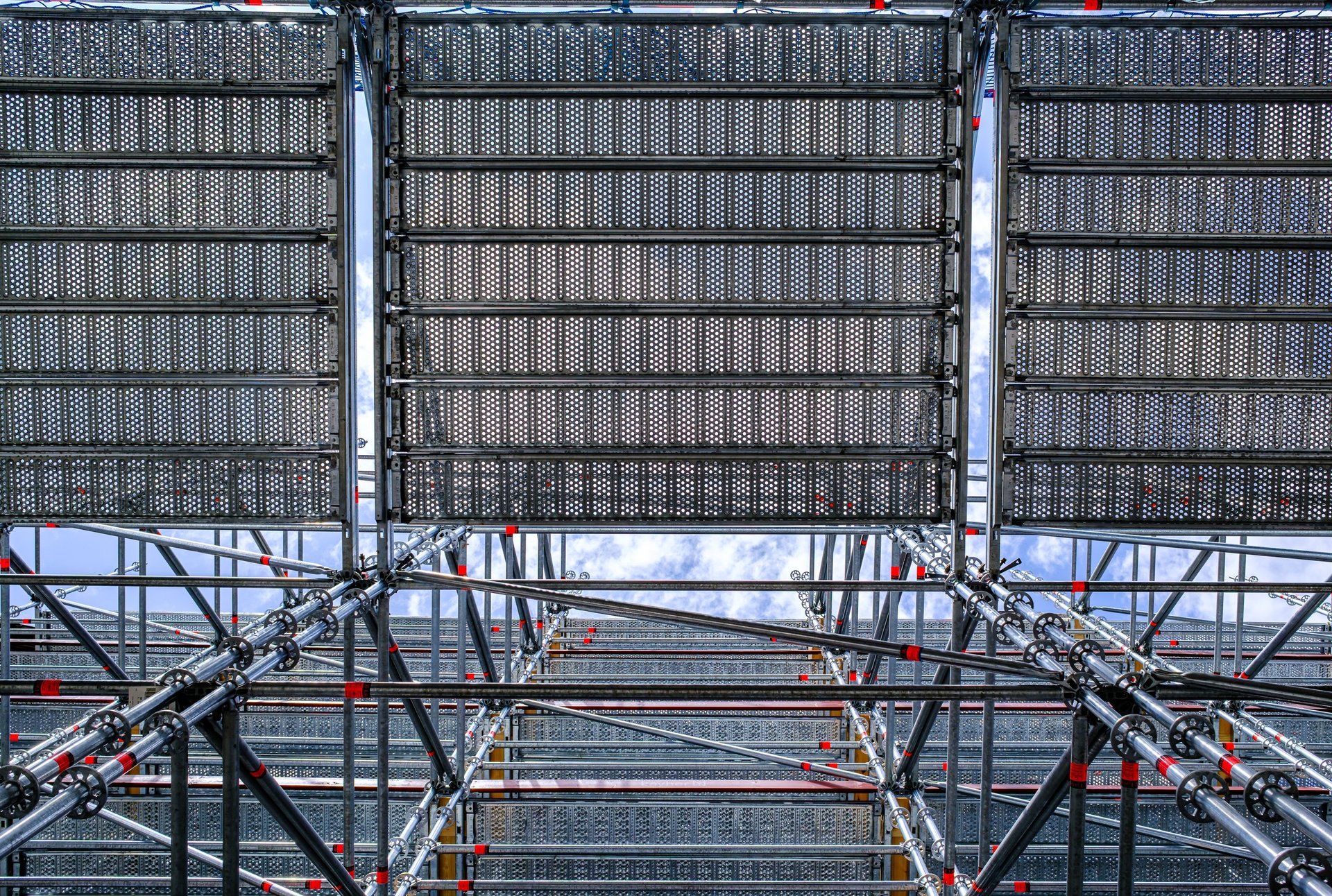 Black Scaffolding Pipe — scaffolding erected at a construction site, showing the tube in its working application context.