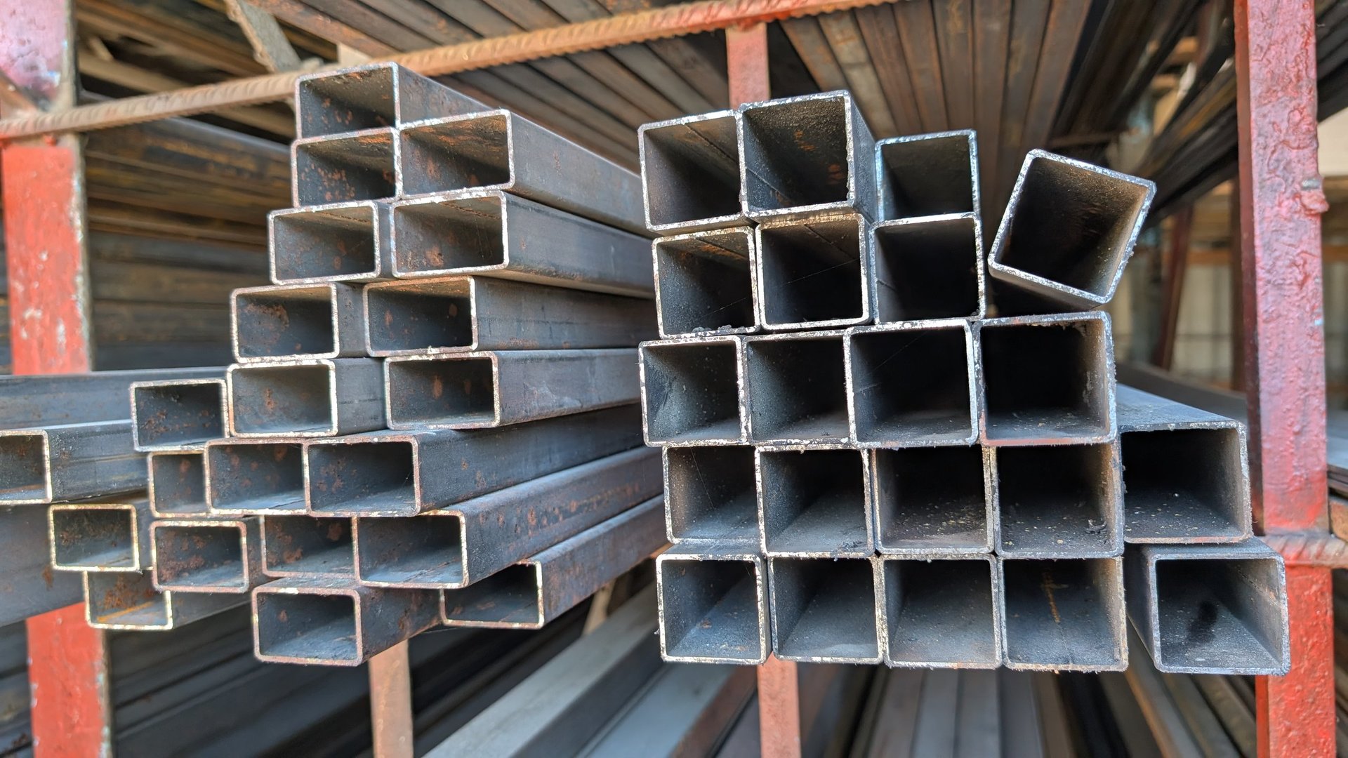 Industrial steel surfaces and product forms showing material and coating differences relevant to industry selection