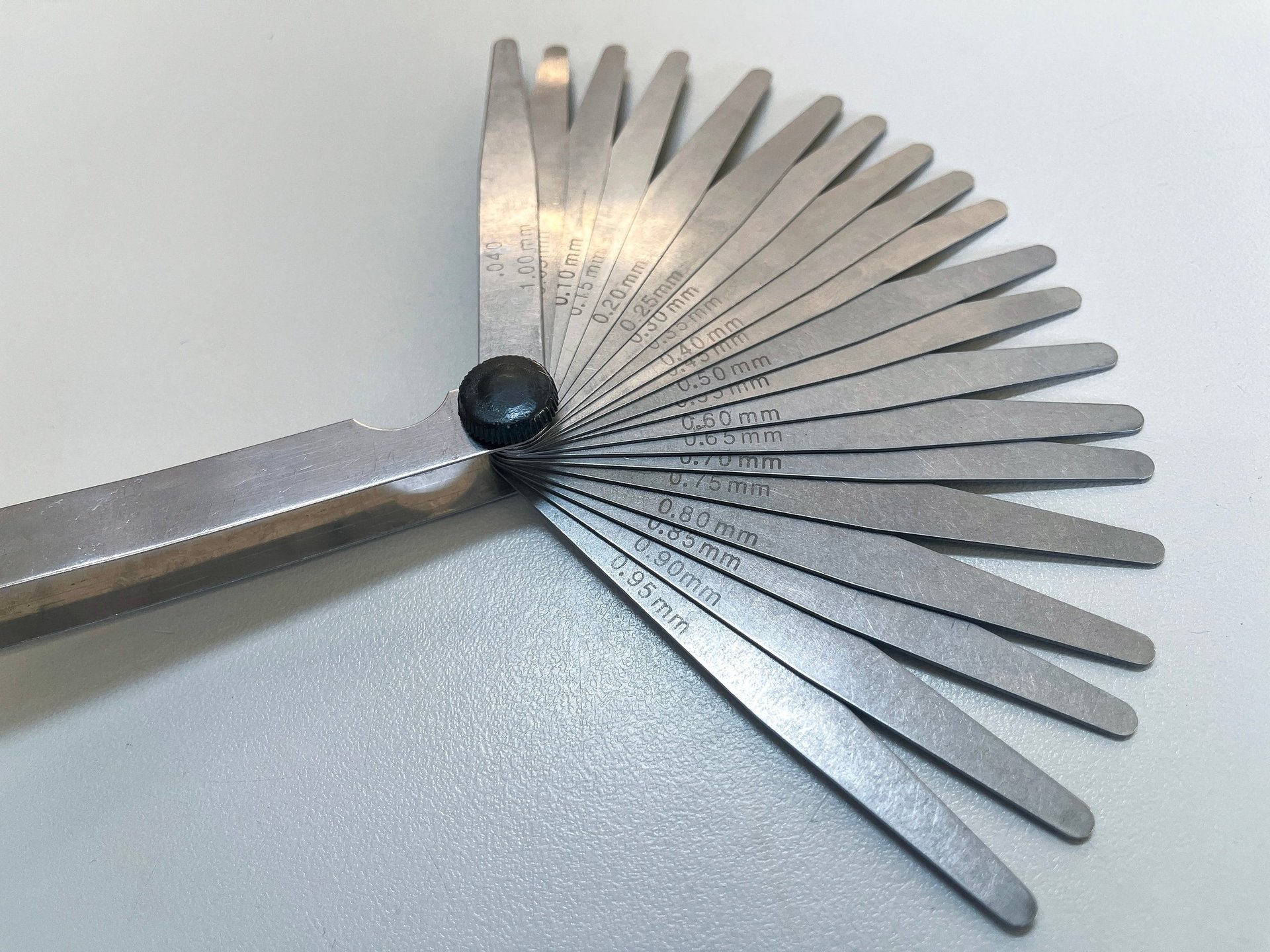 Feeler gauge set used for precise gap and dimensional measurement on metalwork