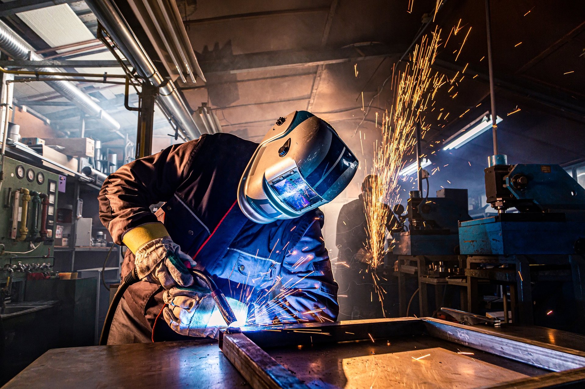 Duplex stainless steel plate procurement scene showing fabrication planning with welding and cut layout preparation