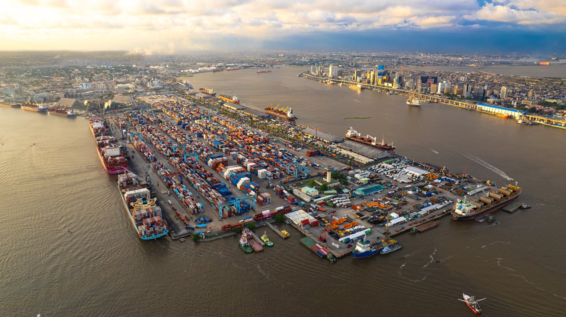 Aerial port terminal with stacked containers, showing the throughput Noor Deira Steel moves into each GCC market