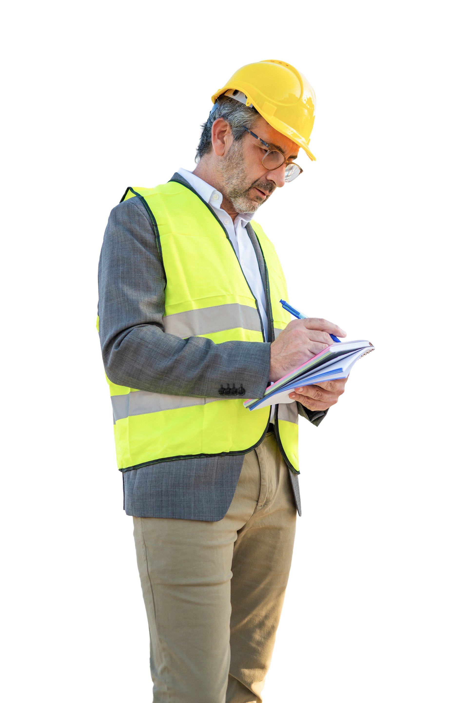 Engineer in a hard hat and safety vest documenting an inspection
