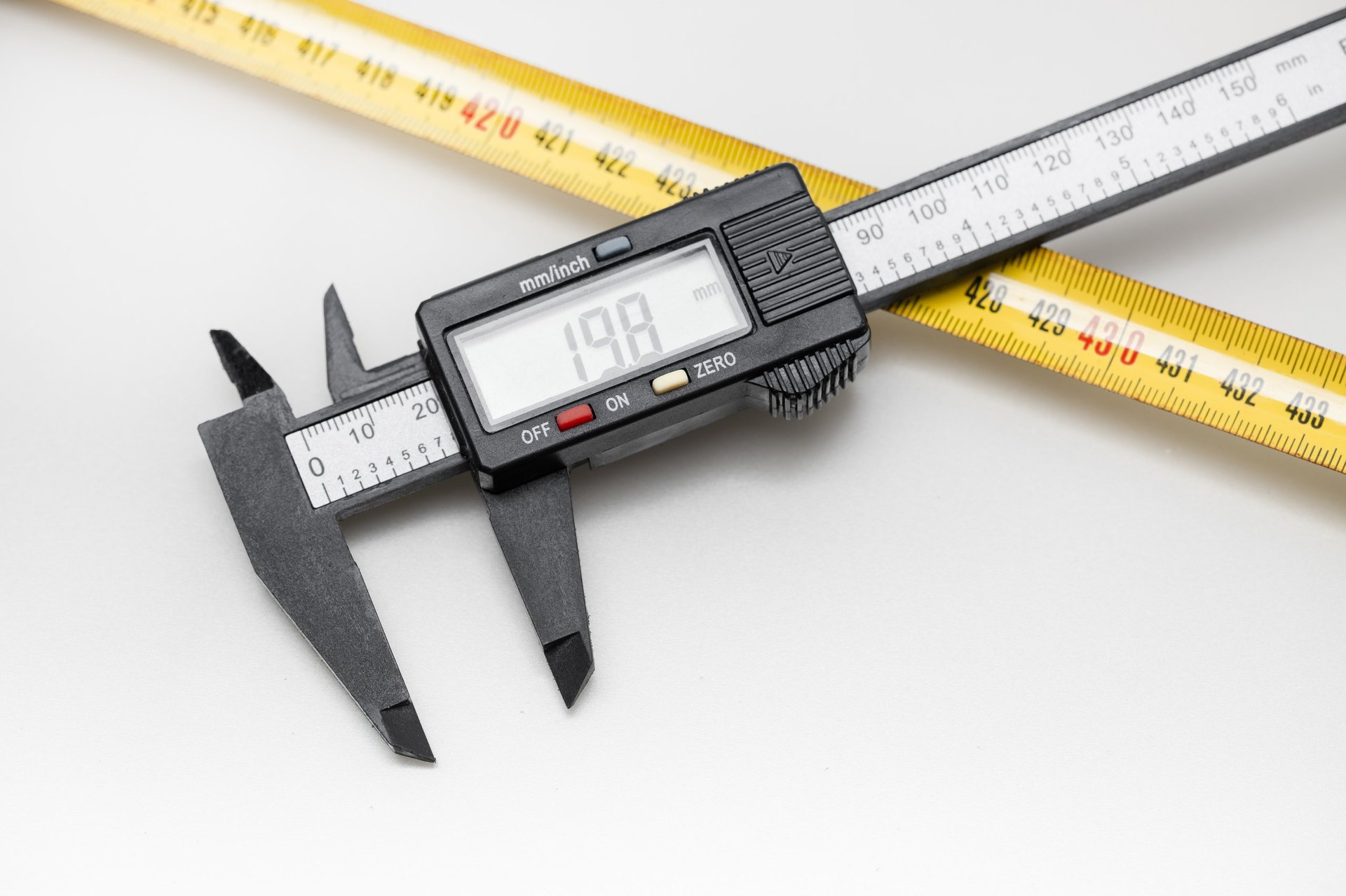 Steel Scaffolding Tube — dimensional inspection detail with measuring instruments on an industrial bench.