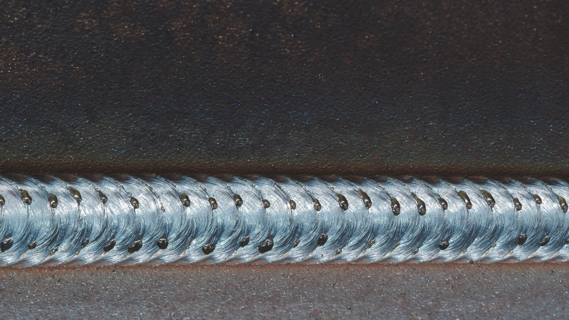 Welded Steel Tube weld seam being checked at a tube end during inspection