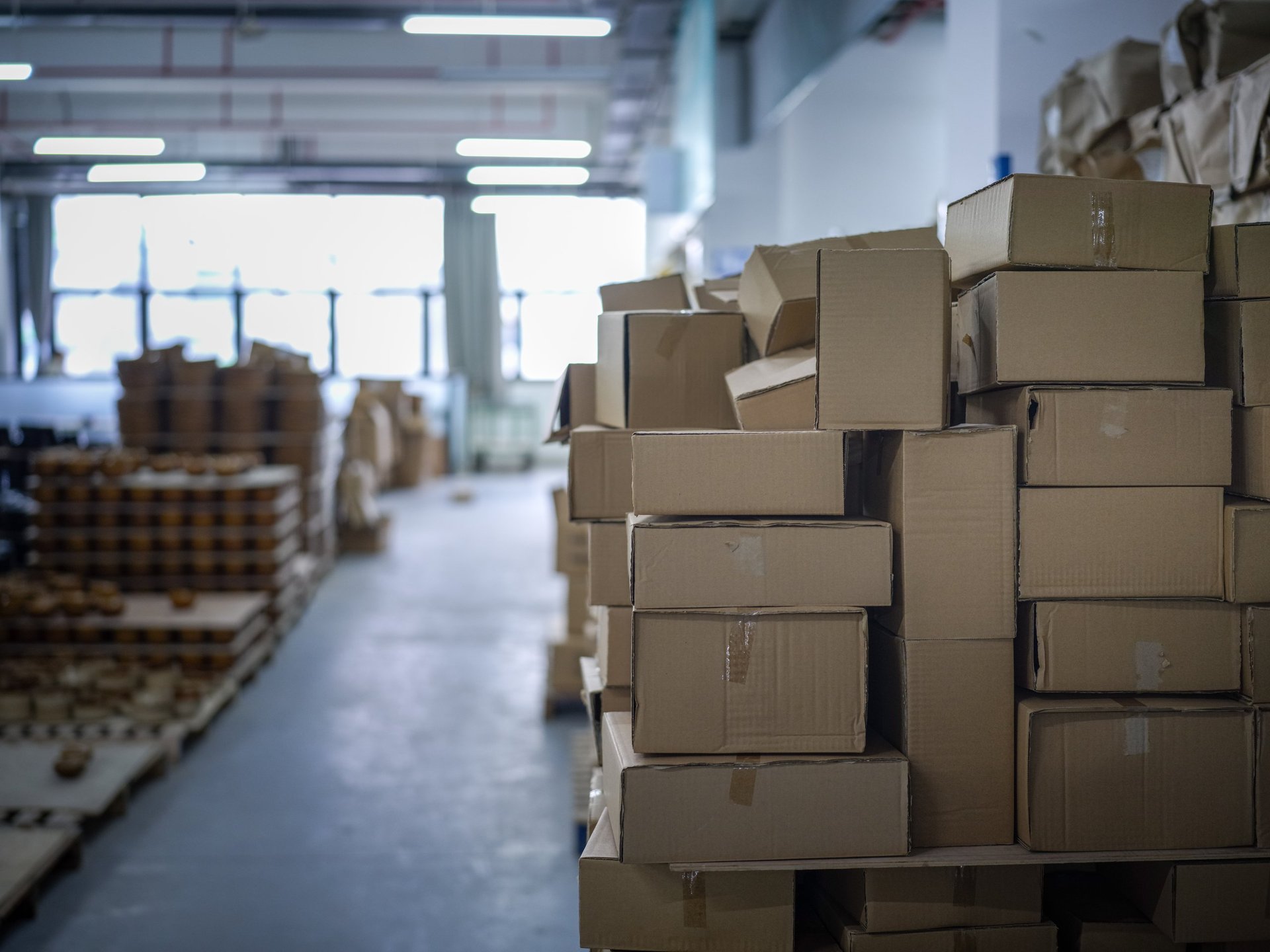 Steel sheet bundles secured and identified for dispatch with packing marks visible