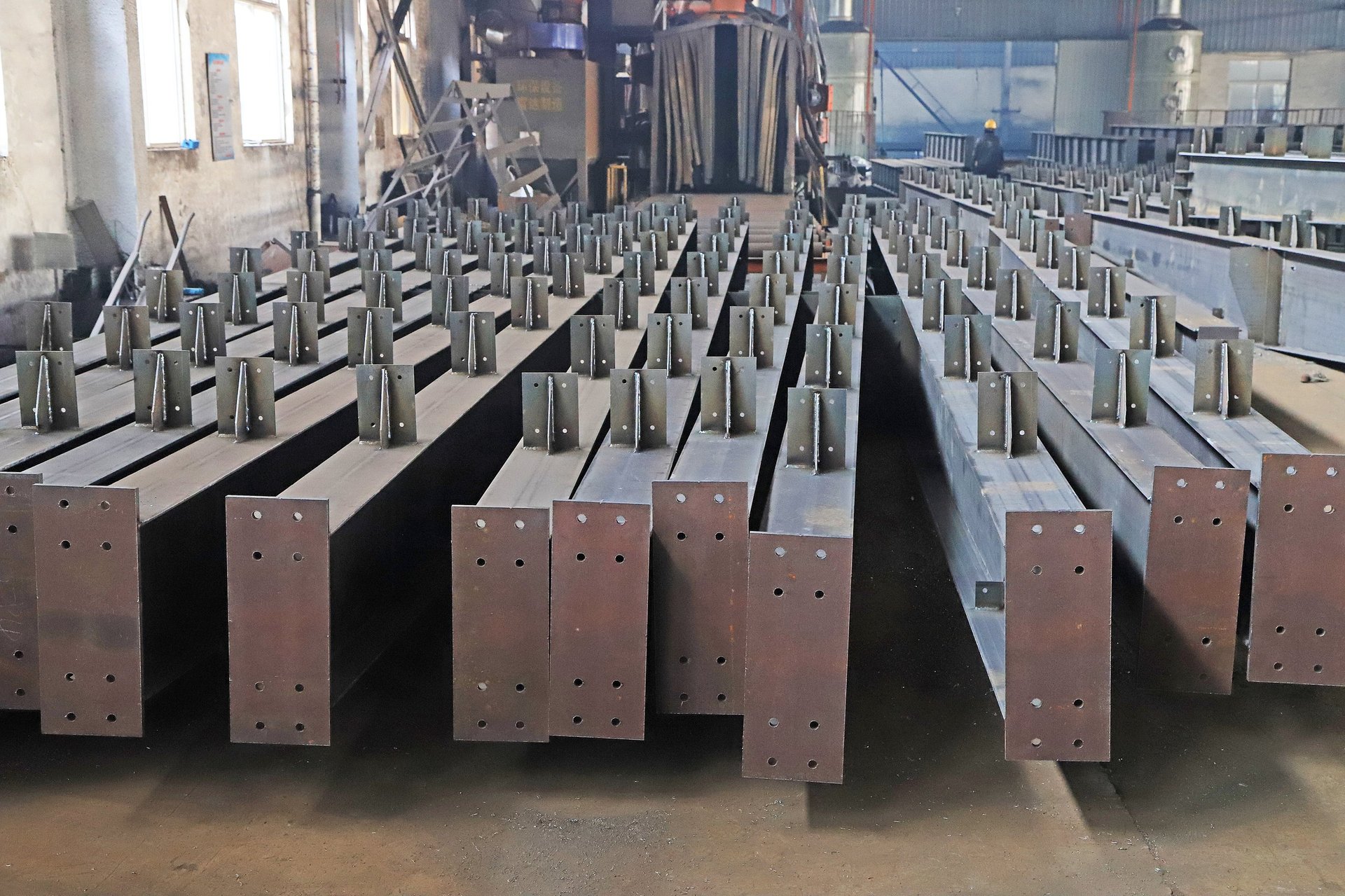 Prefabricated structural steel beams arranged for fabrication and verification