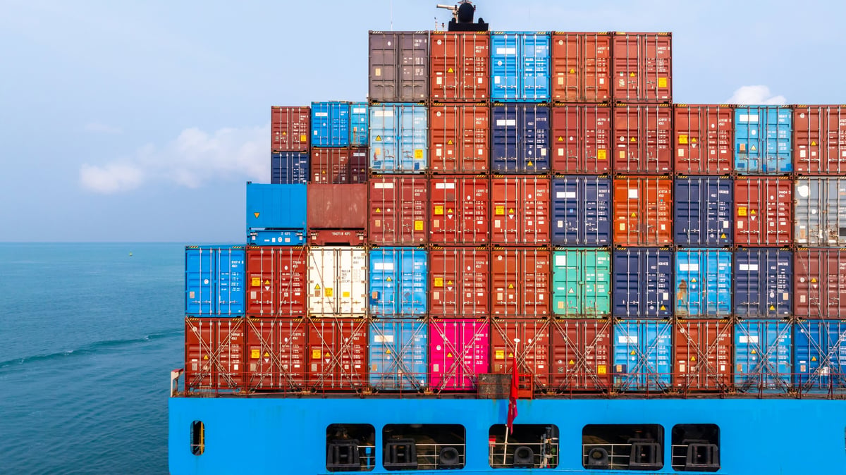 Cargo ship at sea carrying containerised freight for export
