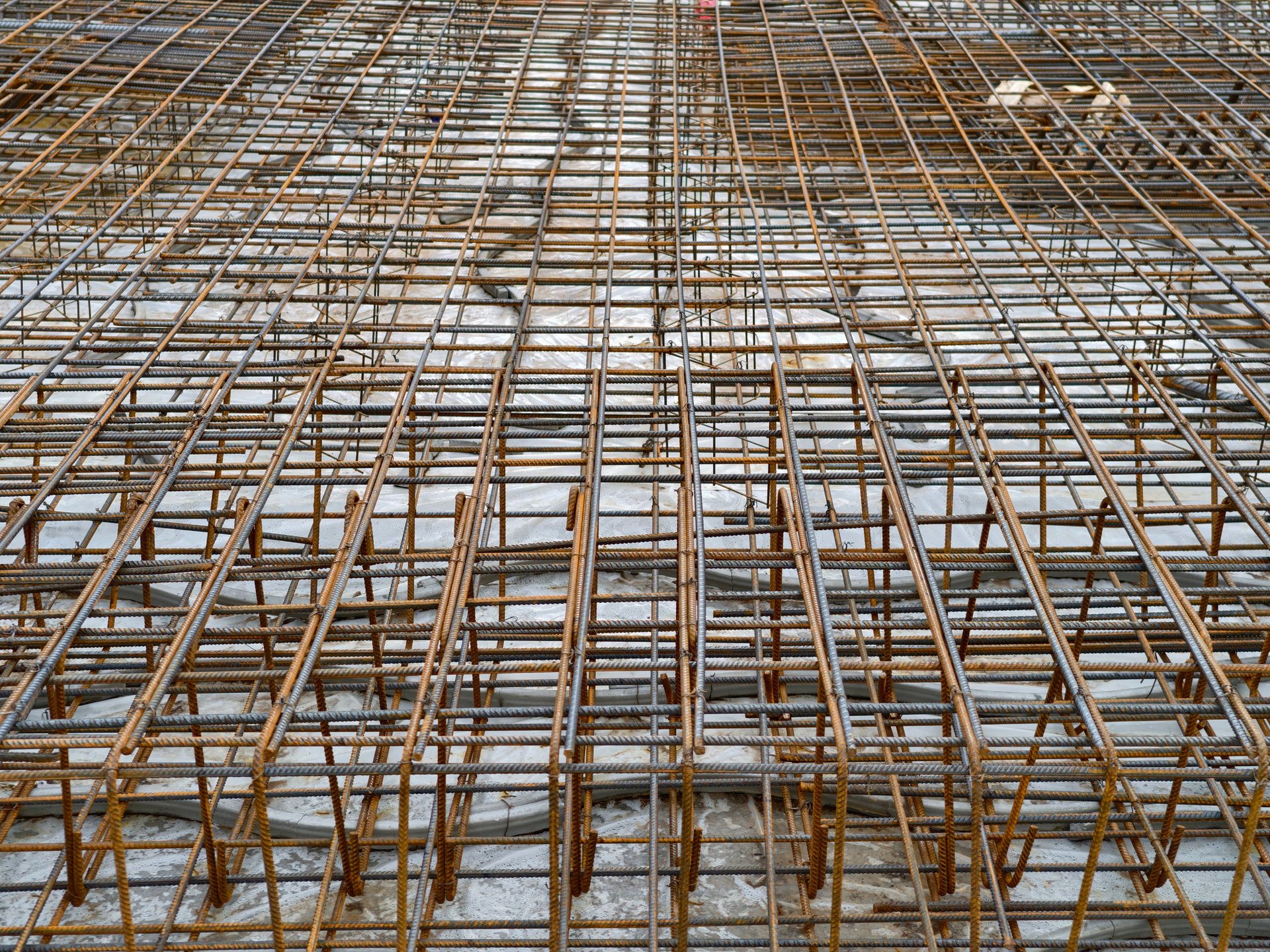 Concrete Reinforcement Bar — tagged rebar delivery lot arranged by element and bar mark with inspection-document pouch visible.