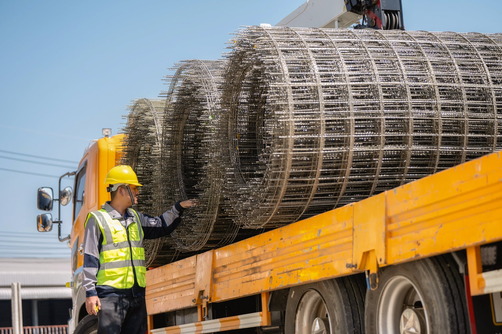 Flat steel coil stock prepared for dispatch in a steel yard