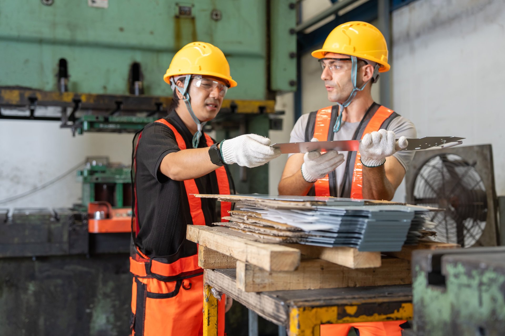 Materials procurement scene showing plate specification review