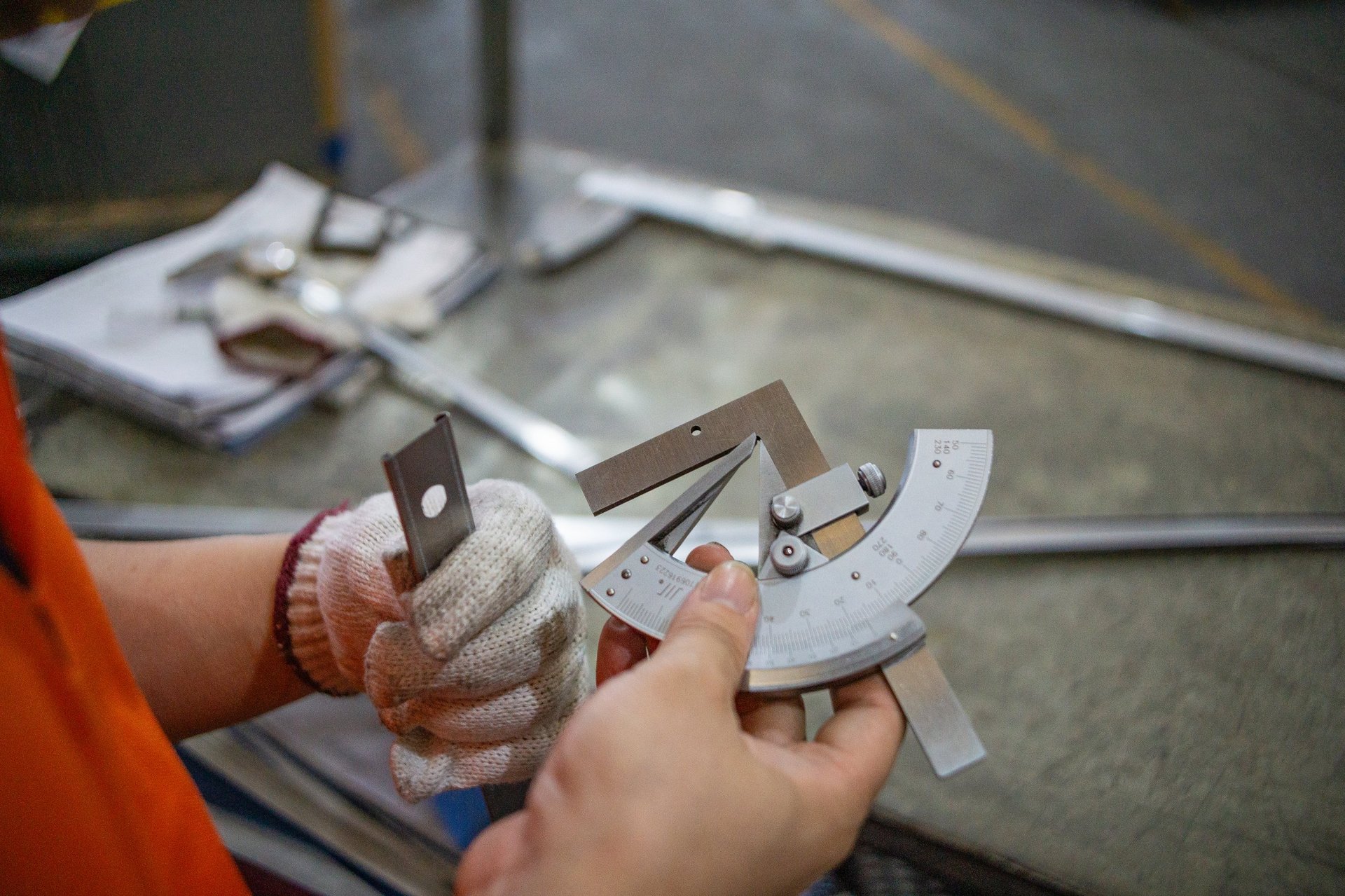 Steel sheet consignment documentation being prepared alongside packed bundles