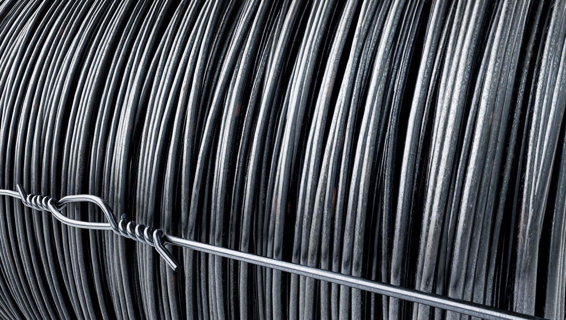 Close view of a steel coil surface with a bound edge