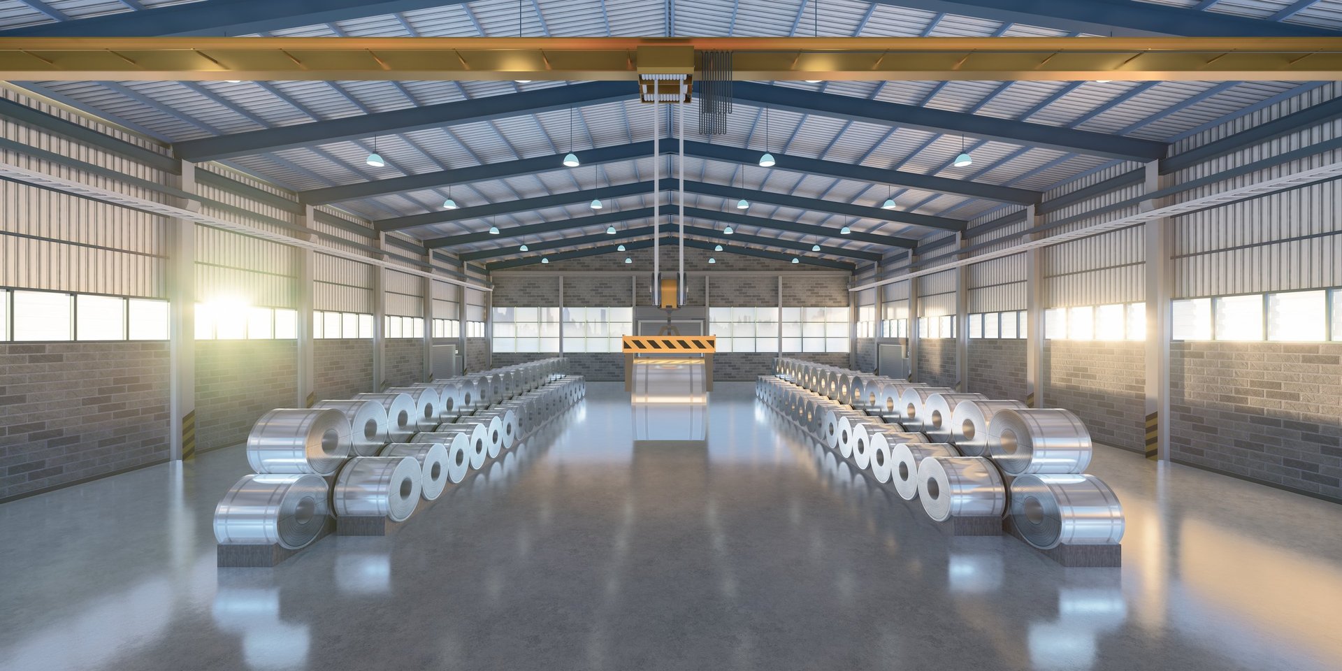 Organised steel coil storage inside an industrial warehouse with overhead crane