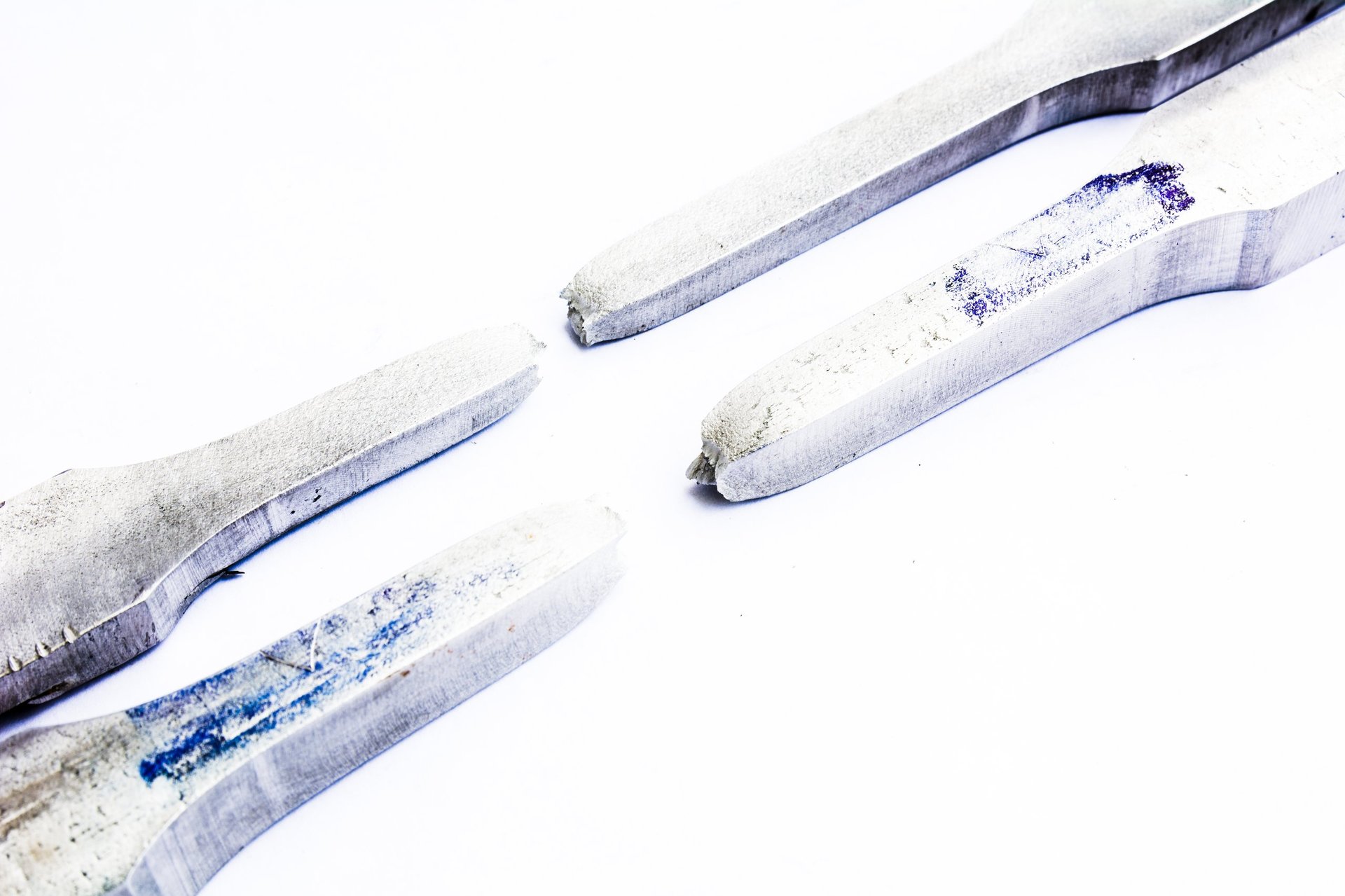 Tensile testing of a steel specimen in a materials laboratory